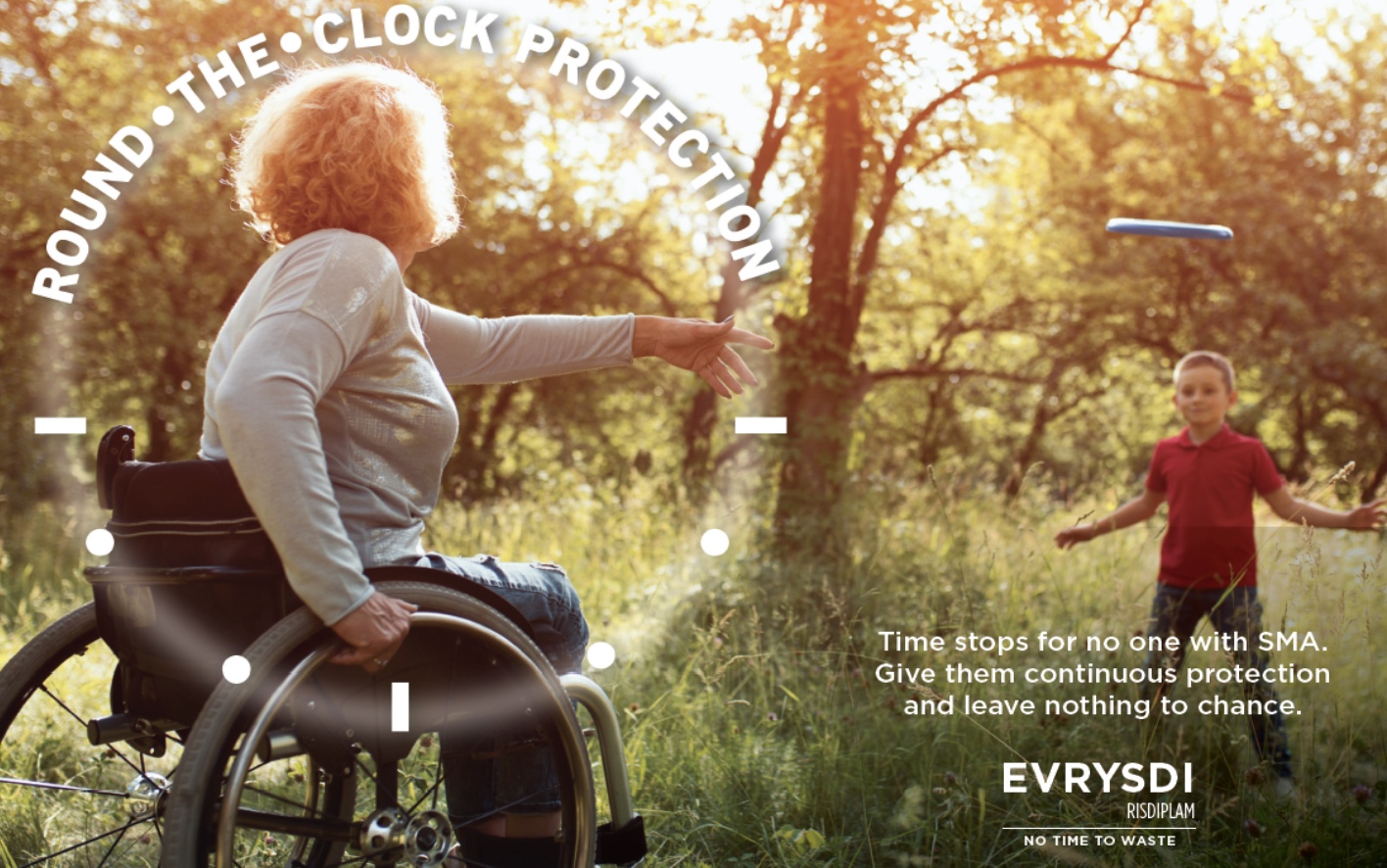 Evrysdi 'Round the clock protection' ad: a woman in a wheelchair tossing a flying disc to a boy in a sunlit field, with the line 'Time stops for no one with SMA. Give them continuous protection and leave nothing to chance.'