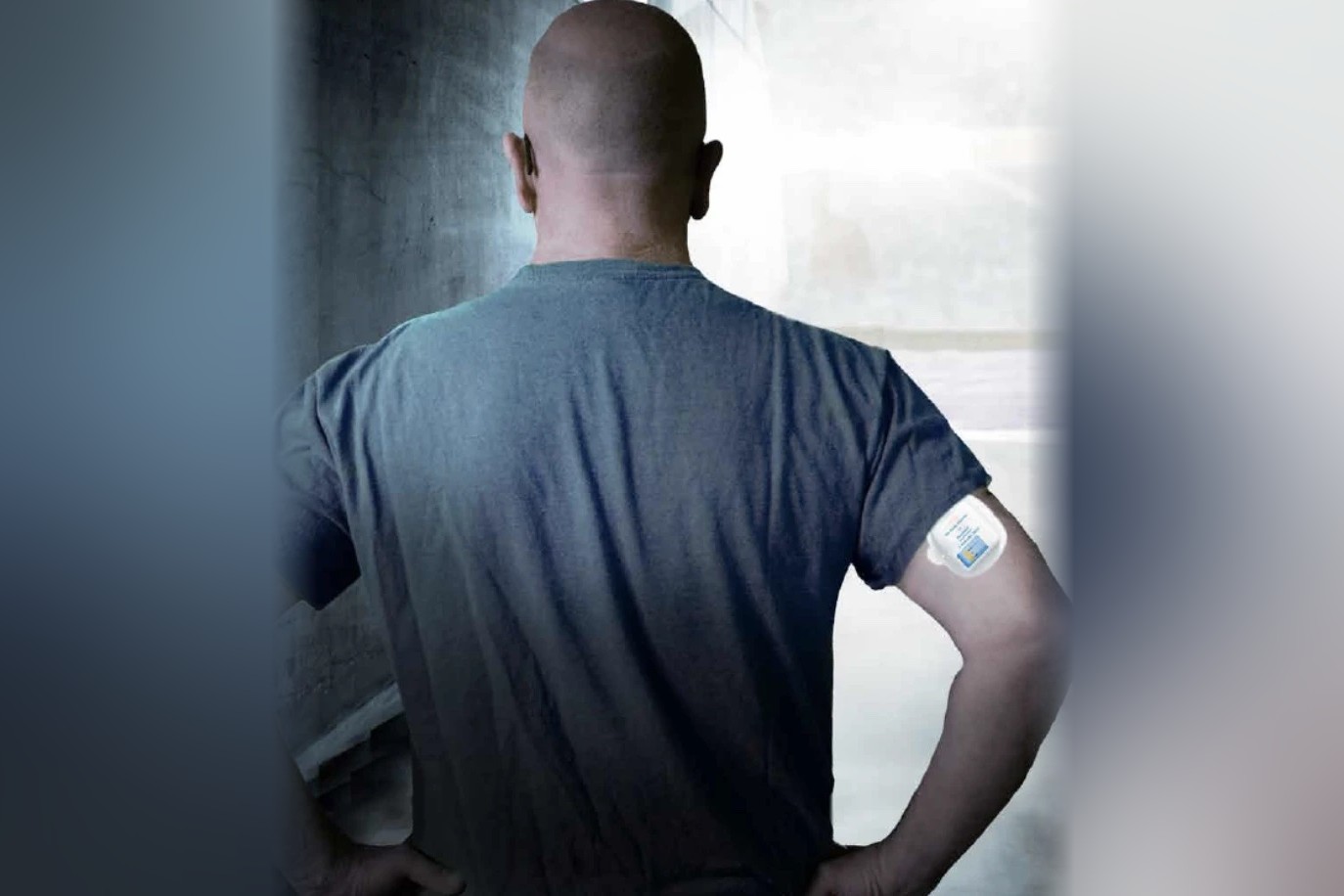 Neulasta Onpro 'It's On' ad detail: a man seen from behind, hands on hips facing a bright corridor, with the on-body injector on his upper arm